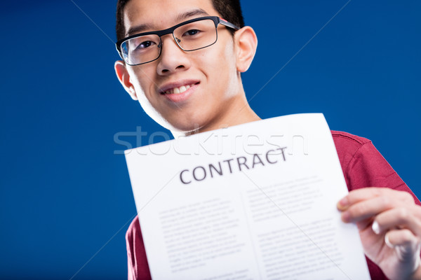 pride Chinese man holding a contract Stock photo © Giulio_Fornasar