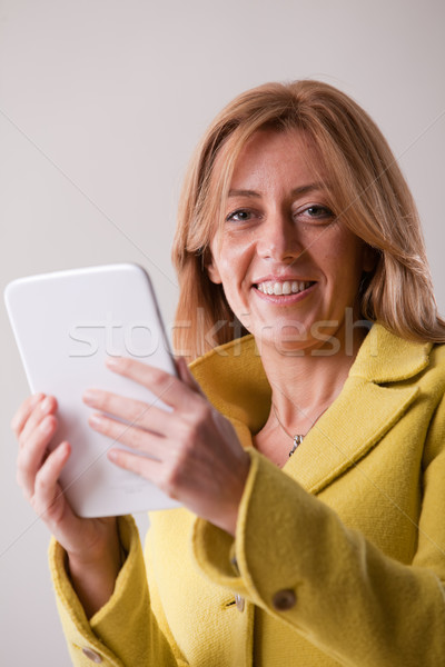 Csinos szőke nő tabletta boldog fehér digitális Stock fotó © Giulio_Fornasar