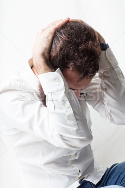 man having problems or headache Stock photo © Giulio_Fornasar