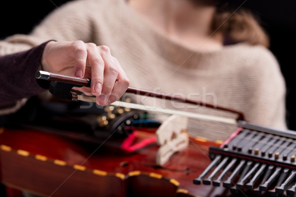 Mujer jugando instrumento musical antigua medieval moderna Foto stock © Giulio_Fornasar