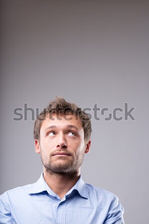 Young man with a contemplative expression Stock photo © Giulio_Fornasar