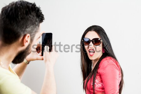 woman disappointed about his man on his mobile Stock photo © Giulio_Fornasar