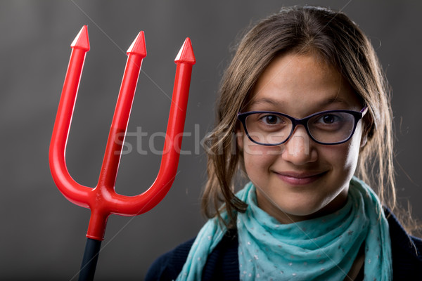 little girl with a big pitchfork Stock photo © Giulio_Fornasar