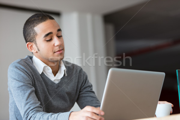 Stock photo: Man working on laptop