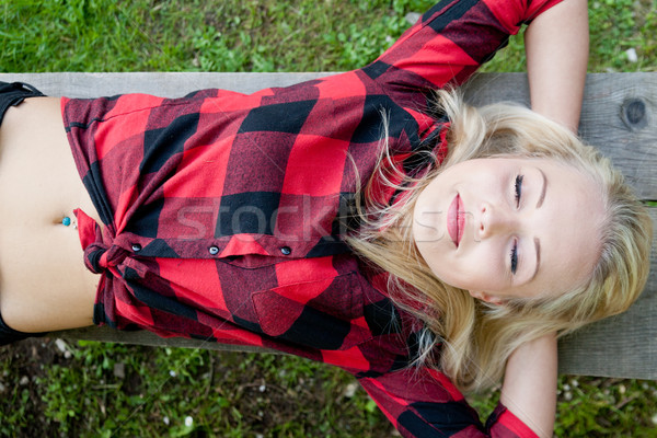 woman sleeping relaxed on a bench Stock photo © Giulio_Fornasar