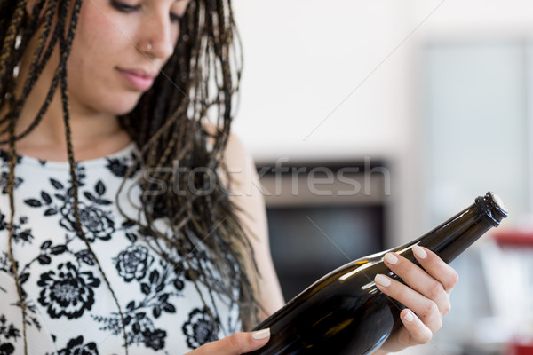 Fiatal nő néz üveg közelkép fiatal csinos nő Stock fotó © Giulio_Fornasar