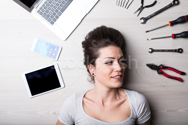 Stock photo: intense look of a woman with digital problems