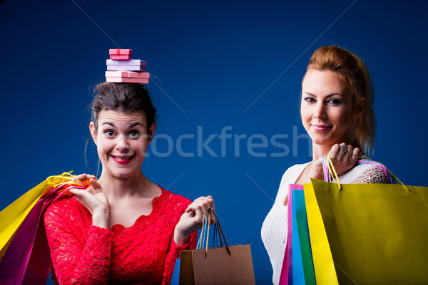 Mulheres compras sacos azul duas mulheres colorido Foto stock © Giulio_Fornasar