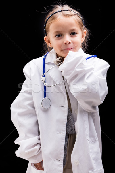 Foto d'archivio: Cute · bambina · giocare · medico · piedi · fotocamera