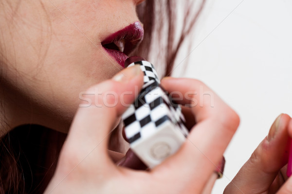 woman applying make up and lipstick Stock photo © Giulio_Fornasar