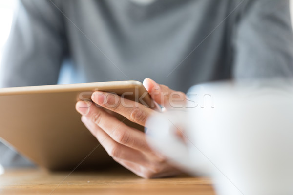 Incognito male holding tablet Stock photo © Giulio_Fornasar