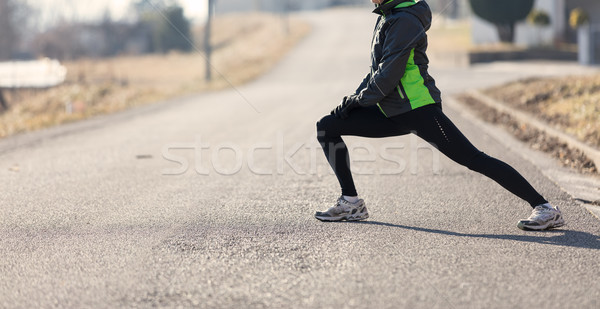 woman warming-up before her running Stock photo © Giulio_Fornasar