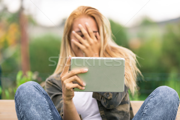 young woman hiding from embarassing thing Stock photo © Giulio_Fornasar