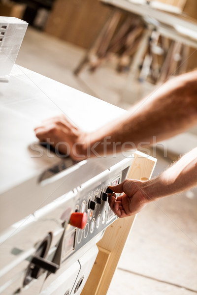 turning on or off a machine in a woodworker workshop Stock photo © Giulio_Fornasar