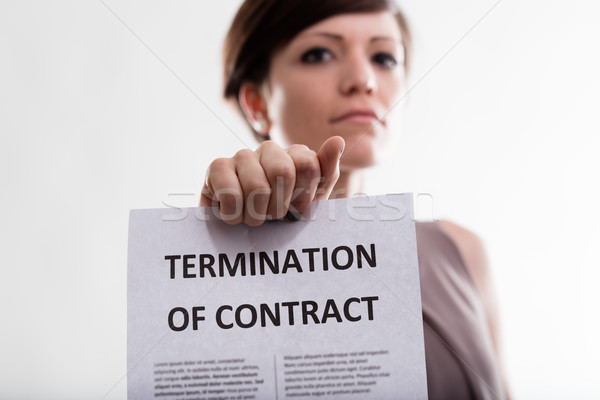 Serious woman holding Termination of Contract Stock photo © Giulio_Fornasar