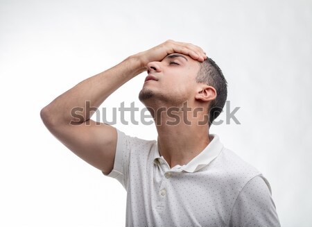 Man covering one eye with his hand Stock photo © Giulio_Fornasar