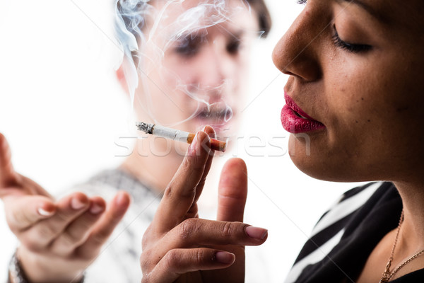 Vrouw roken sigaret teleurgesteld man teleurstelling Stockfoto © Giulio_Fornasar