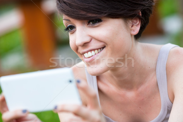 Frau genießen etwas schönen Lächeln Stock foto © Giulio_Fornasar