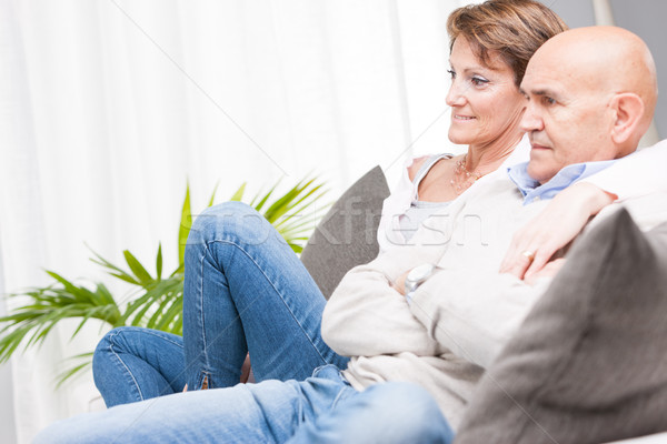 Middle-aged couple relaxing watching television Stock photo © Giulio_Fornasar