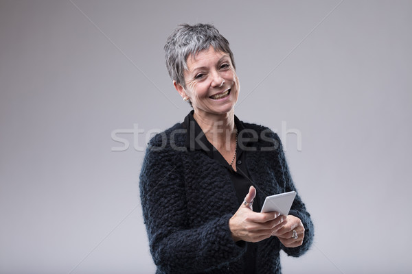 Charismatische ouder vrouw zoete glimlach Stockfoto © Giulio_Fornasar