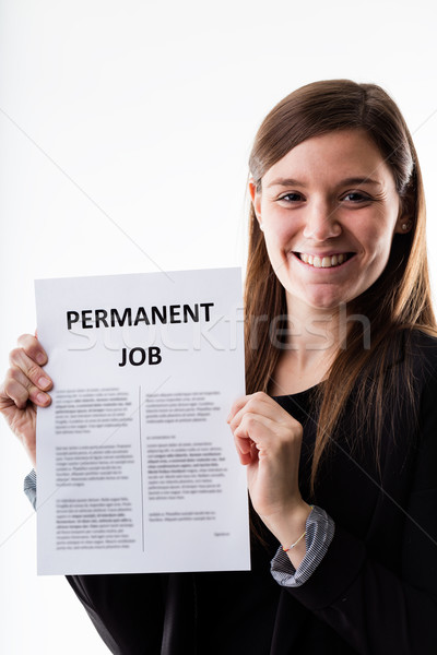 woman proudly holding her job contract Stock photo © Giulio_Fornasar