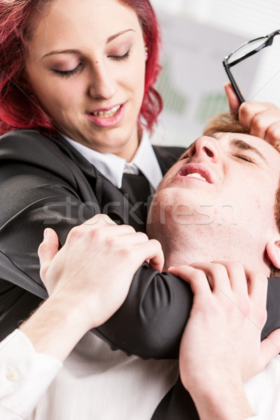 woman violently abusing of a man colleague Stock photo © Giulio_Fornasar