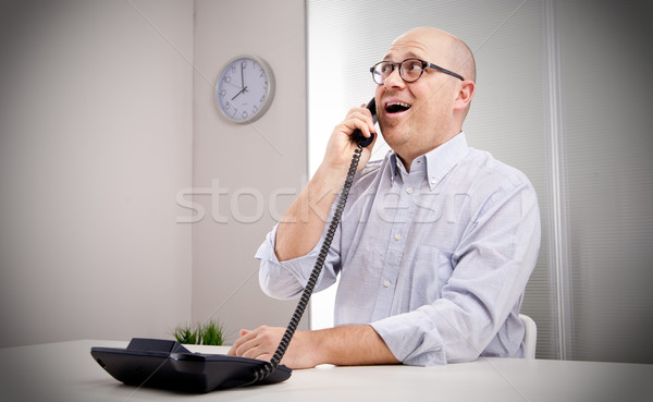 Pewny człowiek biuro słuchania telefonu uśmiechnięty Zdjęcia stock © Giulio_Fornasar