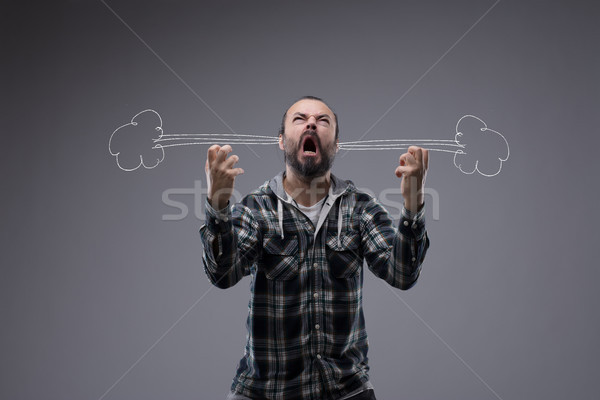 Very angry man letting off steam Stock photo © Giulio_Fornasar