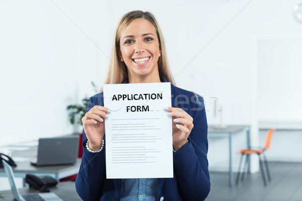 application form shown by woman Stock photo © Giulio_Fornasar