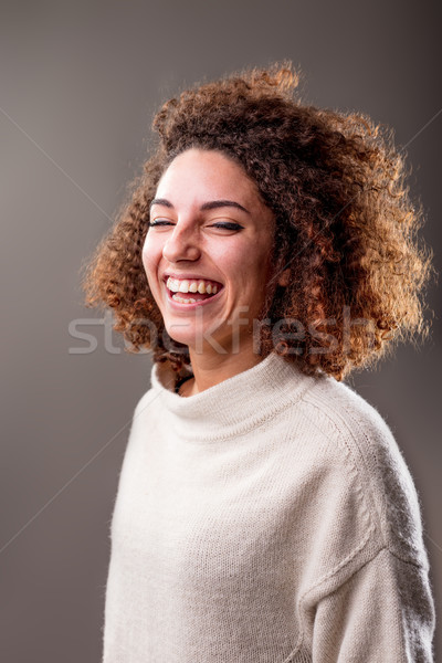 Fericit femeie râsete întuneric Imagine de stoc © Giulio_Fornasar