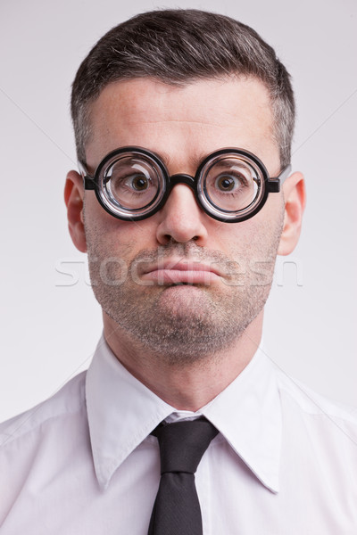 upset and disappointed nerd clerk Stock photo © Giulio_Fornasar