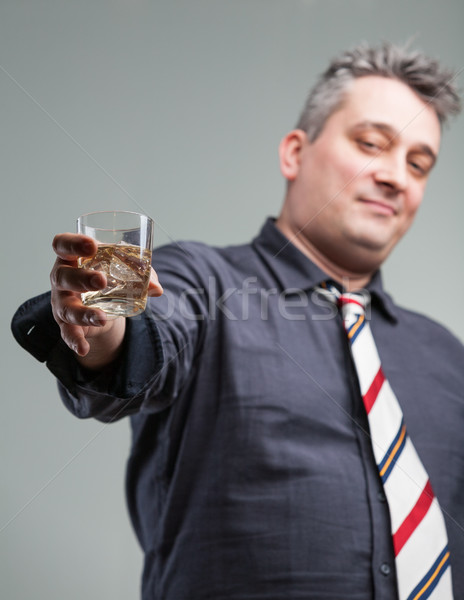 man offering some liquid courage Stock photo © Giulio_Fornasar