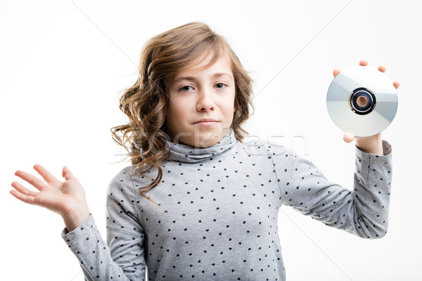 CD-ROM is unknown for this girl Stock photo © Giulio_Fornasar