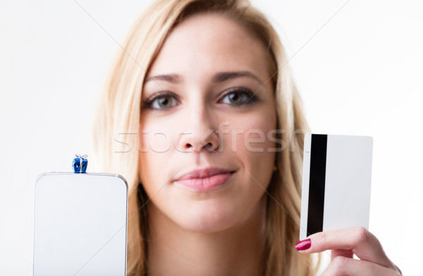 little gift packet on a smartphone and a girl with a credit card Stock photo © Giulio_Fornasar