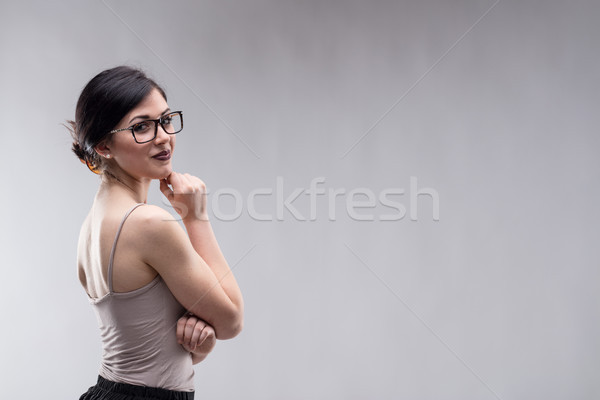 Beautiful woman looking over shoulder Stock photo © Giulio_Fornasar