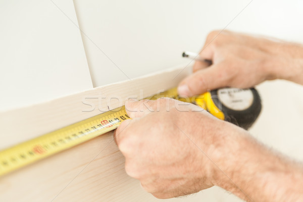 woodworker artisan in his workshop measuring Stock photo © Giulio_Fornasar