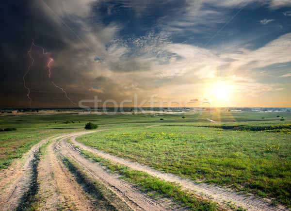 Storm over the road in field Stock photo © Givaga