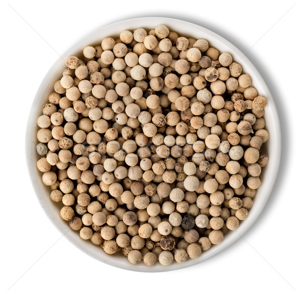 White pepper in plate isolated Stock photo © Givaga