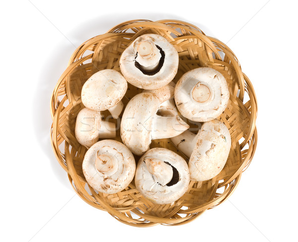 Mushrooms in a wooden basket Stock photo © Givaga