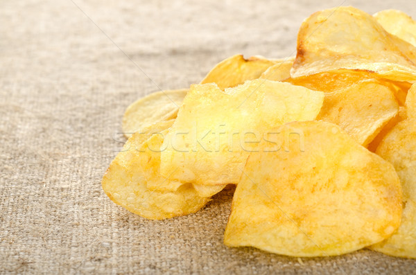 Potato chips on a canvas Stock photo © Givaga
