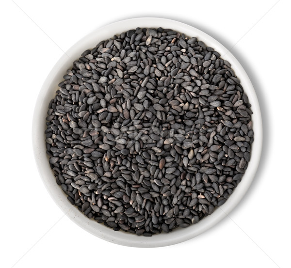Black sesame in plate isolated Stock photo © Givaga