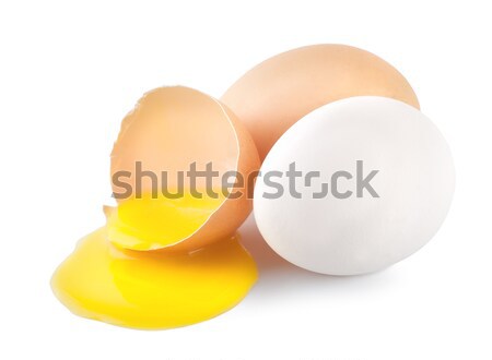 Broken eggs with a yellow yolk Stock photo © Givaga