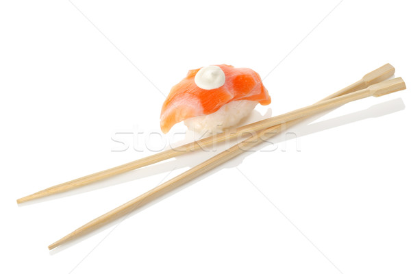 Wooden chopsticks and sushi Stock photo © Givaga