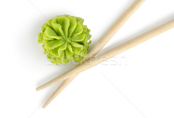 Wooden chopsticks and wasabi isolated Stock photo © Givaga