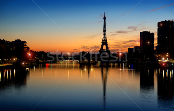 Tôt le matin Paris Tour Eiffel gratte-ciel France eau Photo stock © Givaga