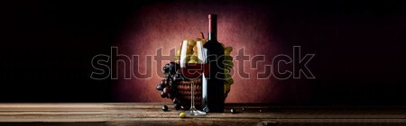 Wine with grape in basket Stock photo © Givaga