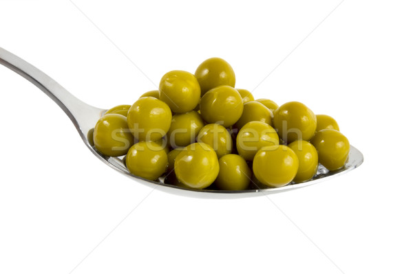 Canned green peas in a spoon Stock photo © Givaga