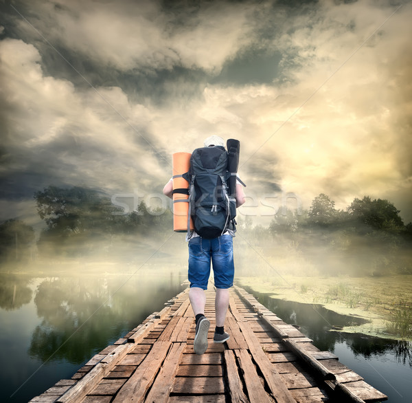 Tourist on the wooden bridge Stock photo © Givaga