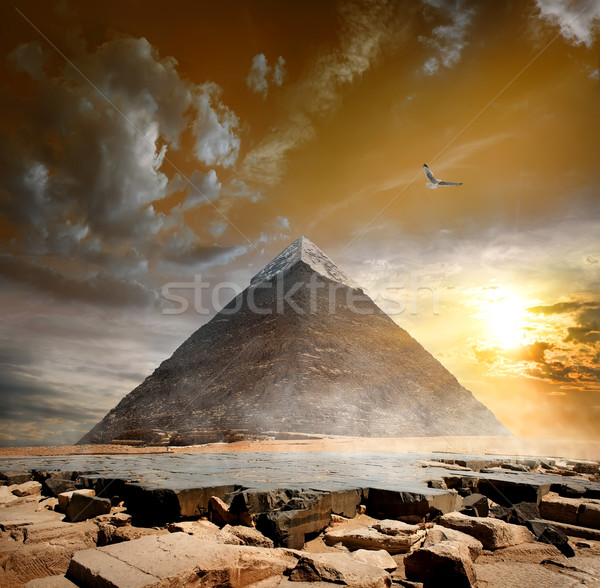 Piramide wolken onweerswolken zonsondergang landschap woestijn Stockfoto © Givaga