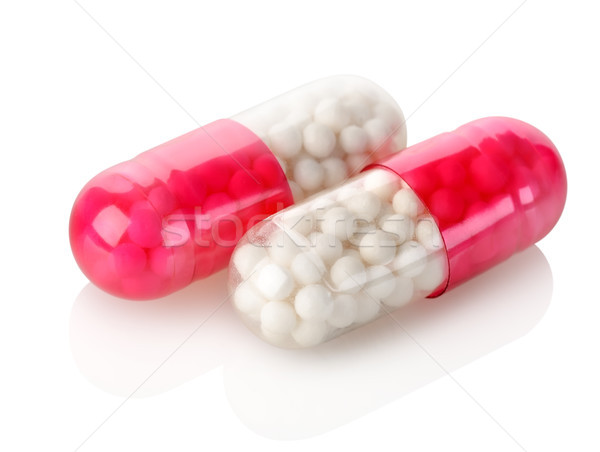 二 紅色 膠囊 孤立 白 醫藥 商業照片 © Givaga